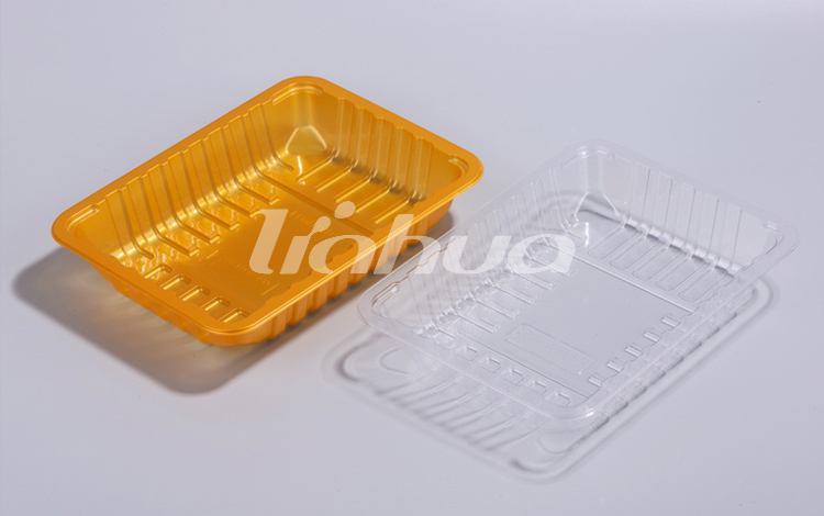 Bagaimana cara menentukan kedalaman dan geometri baki yang benar untuk Baki Kemasan Vakum (VSP) guna memastikan lapisan lapisan kulit yang tepat menutupi produk yang bentuknya tidak beraturan?